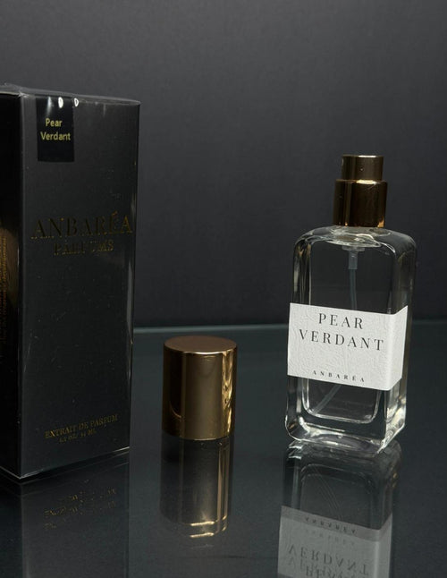 Pear Verdant Extrait de Parfum — clear bottle with gold cap beside its black Anbaréa box