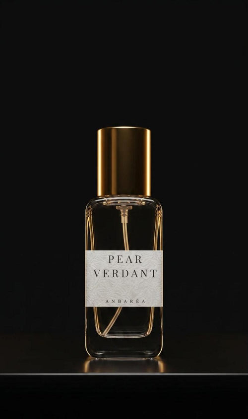 Pear Verdant bottle in low warm light against a dark backdrop